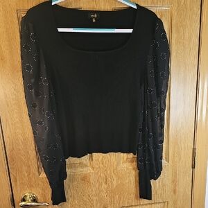 Chic Black Blouse with Sheer Patterned Sleeves